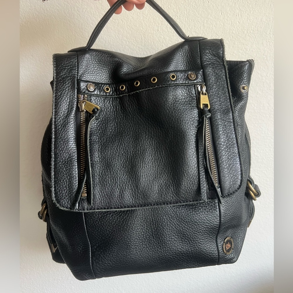 The Sak Black Leather Backpack with Gold Accents